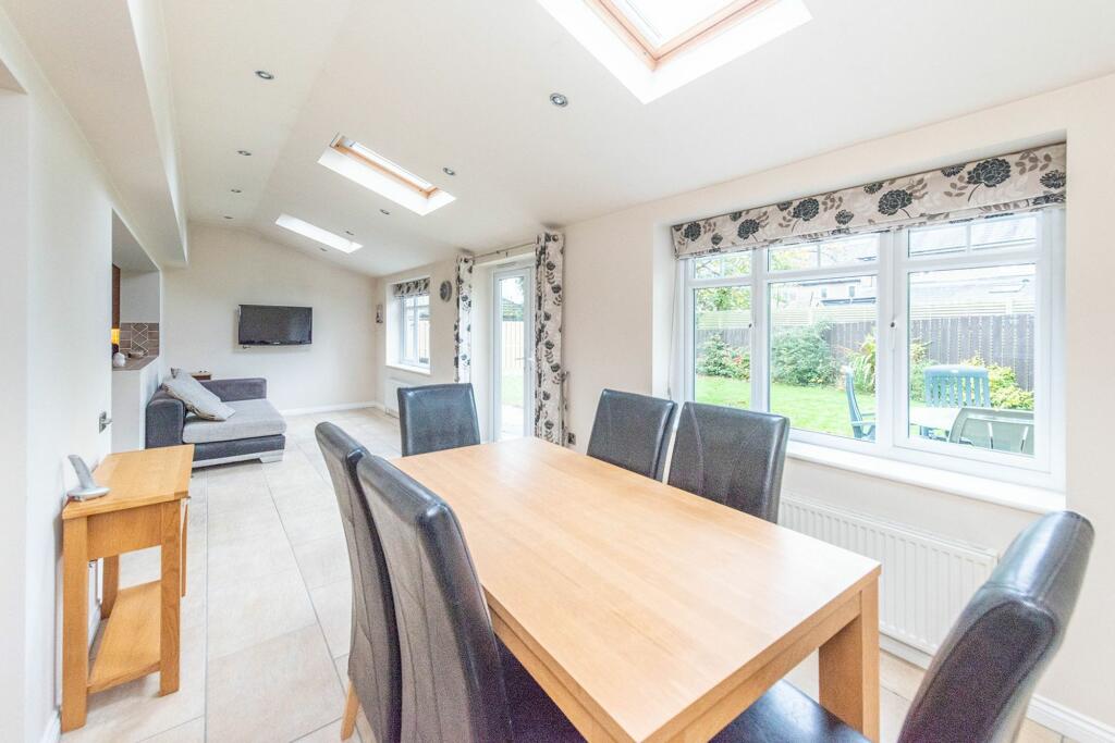 SITTING ROOM AND EXTENDED DINING KITCHEN