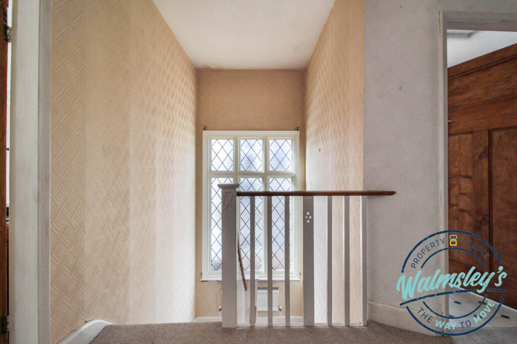 Landing with stunning portrait window