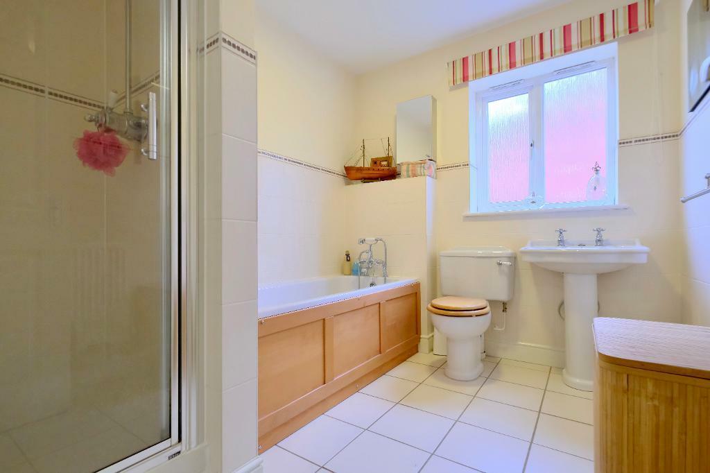 Family bathroom with enclosed shower