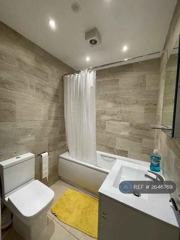 Downstairs Bathroom With Bath