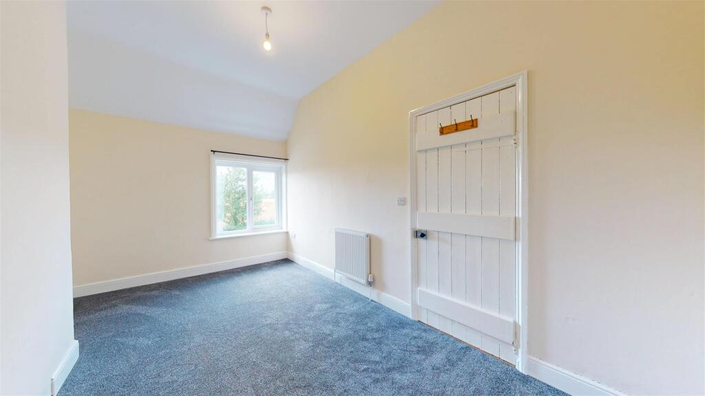 Broad Oak Cottage 6 Bedroom One.jpg