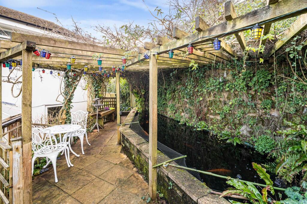 Under cover area with fish pond