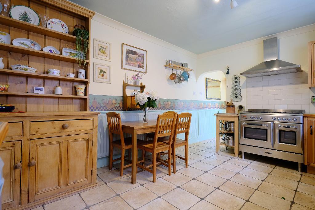 Country kitchen with gas range