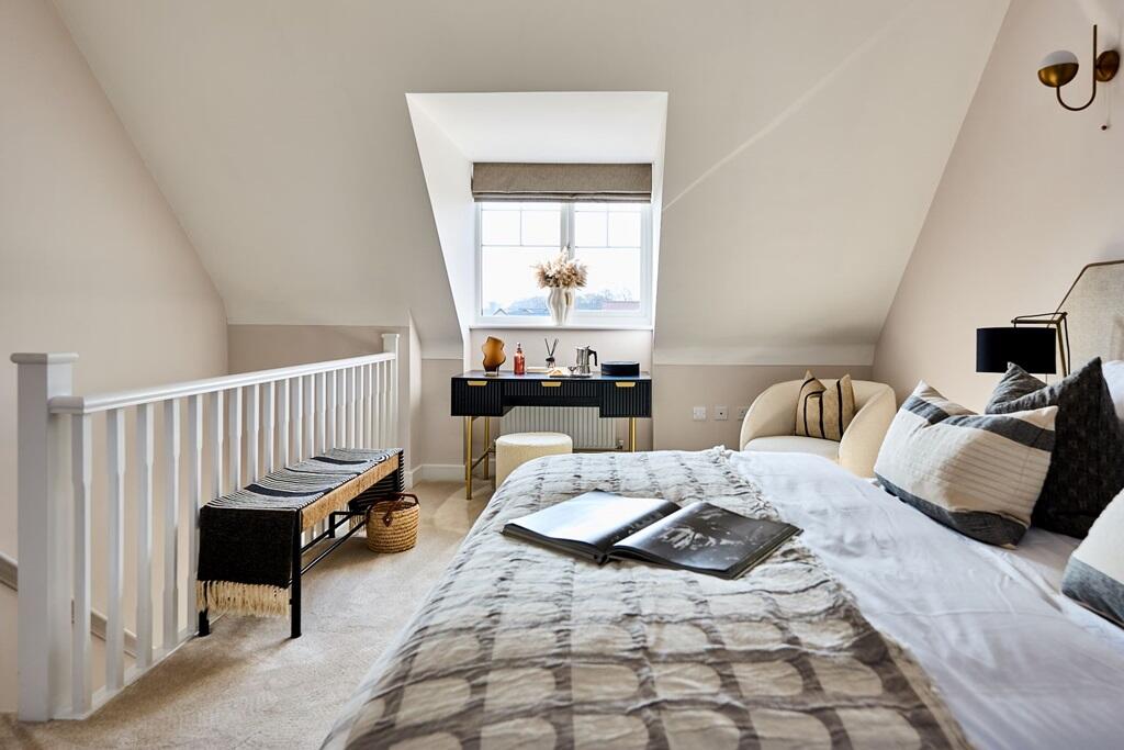 This impressive main bedroom occupies the entire second floor