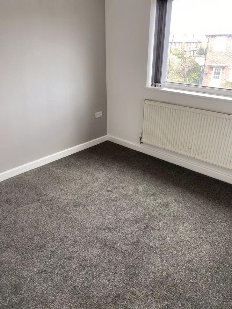 A clean and well-maintained single bedroom with...