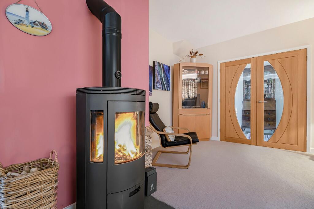 Living room with wood burner
