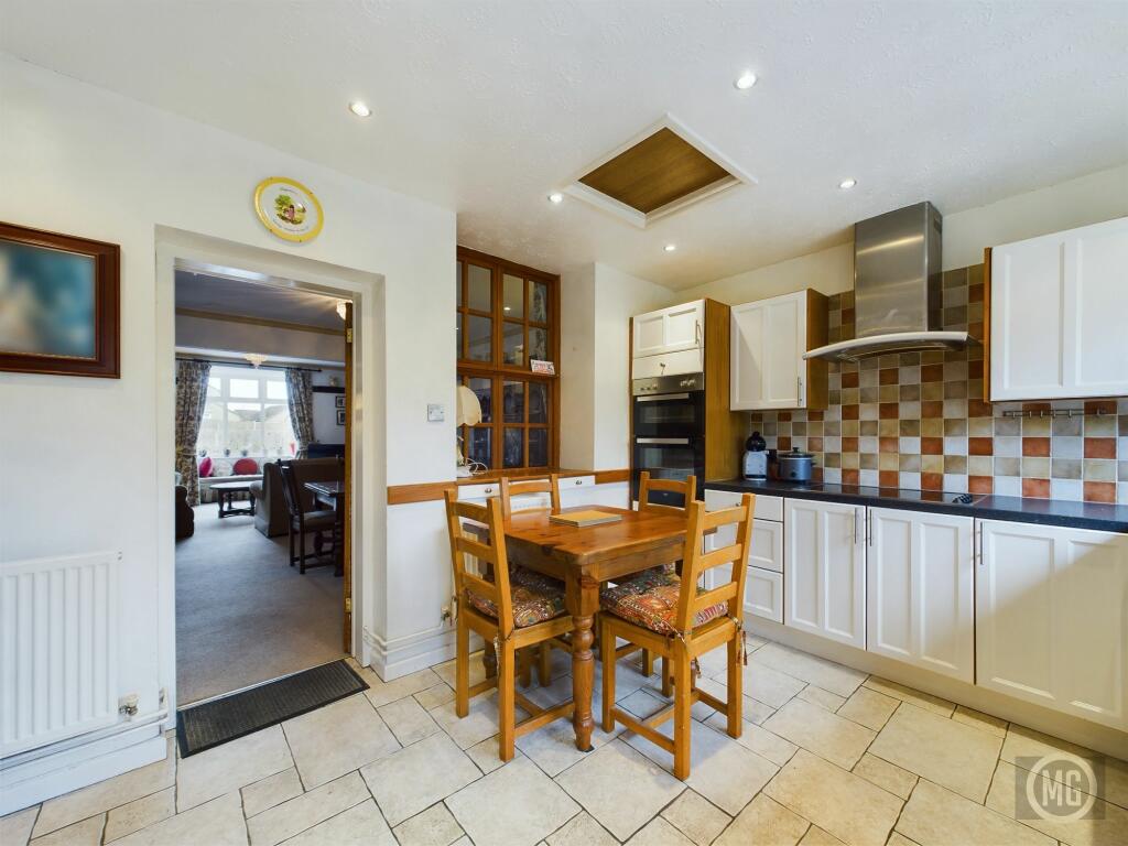 Kitchen leading into Dining Area