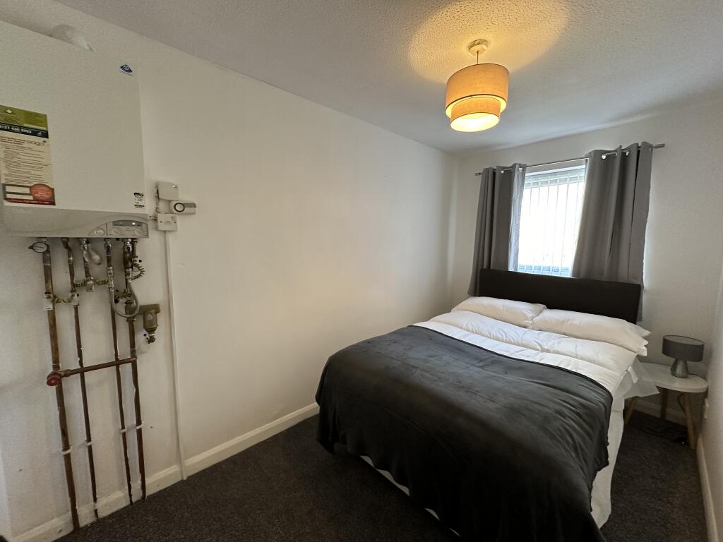 11. Bedroom two.JPG