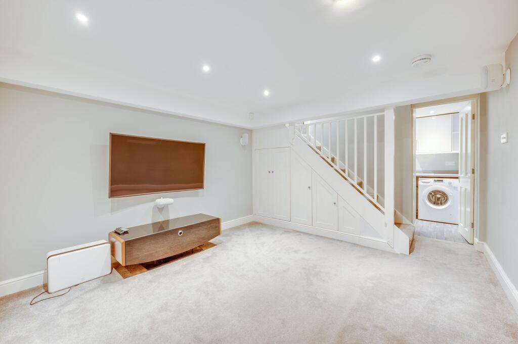 CONVERTED BASEMENT LIVING/CINEMA ROOM