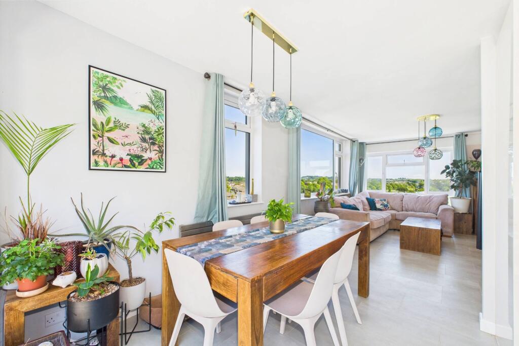 Dining area leading to living room