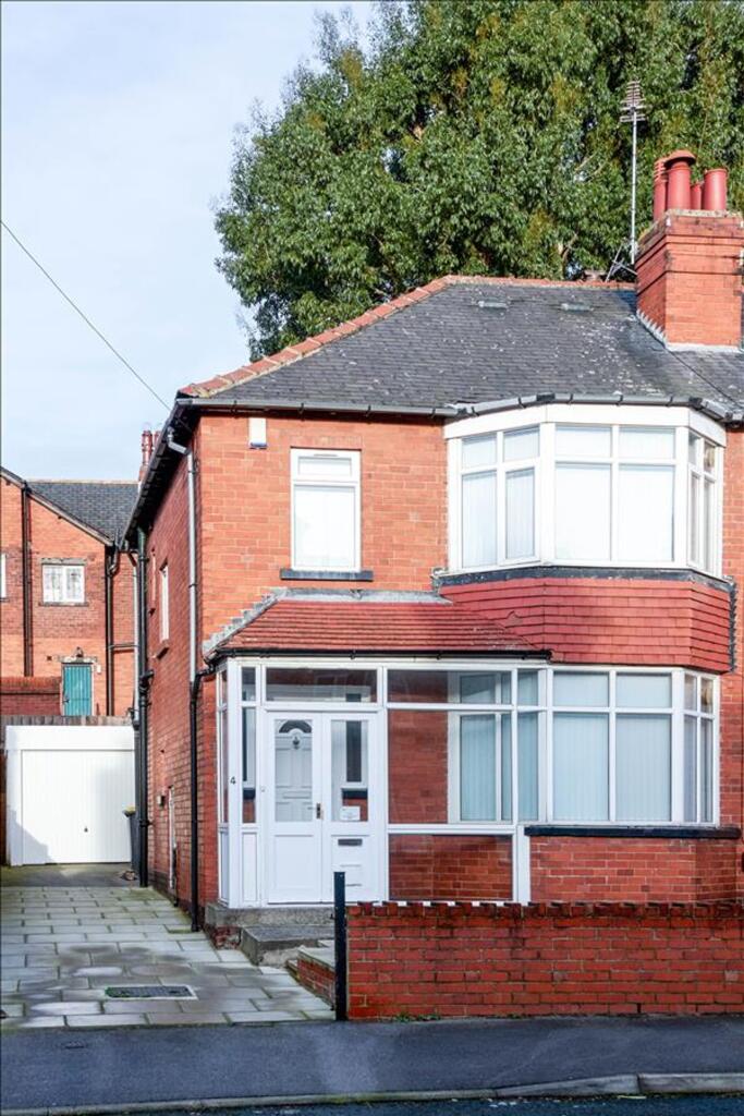 This charming red-brick property features a wel...