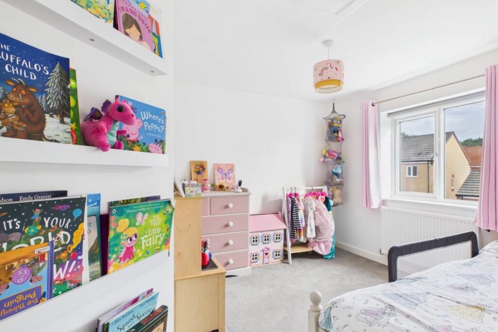 A lovely size double bedroom at the back of the ho