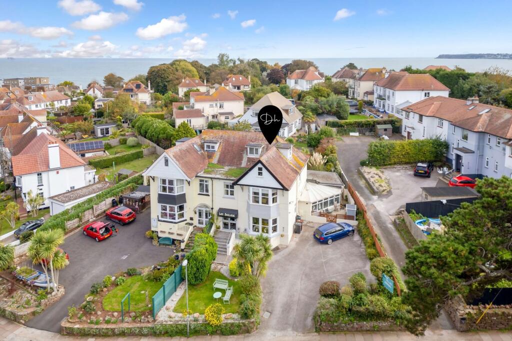 Aerial of Roundham with sea backdrop