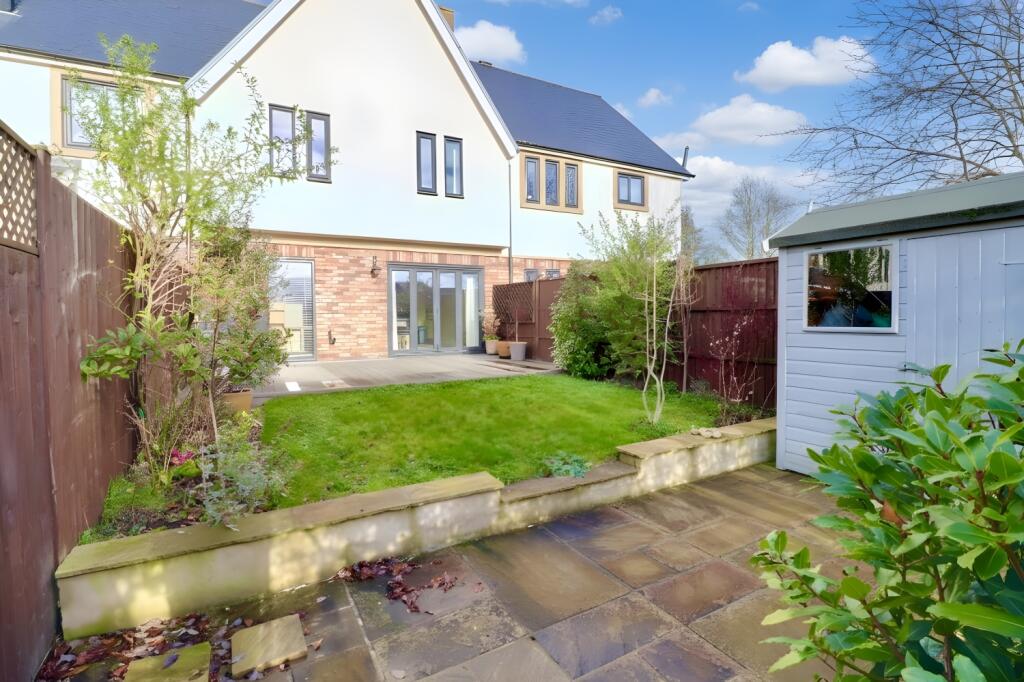 South-facing garden with composite decking