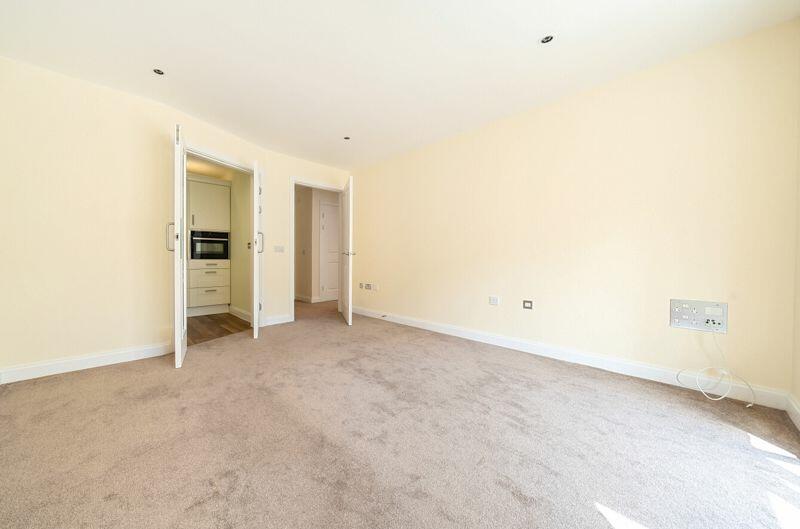 Living/dining room through to kitchen