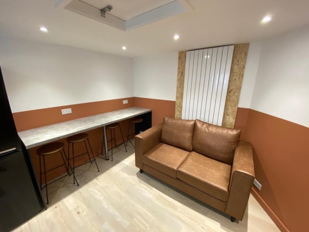 A stylish living room featuring a modern design...