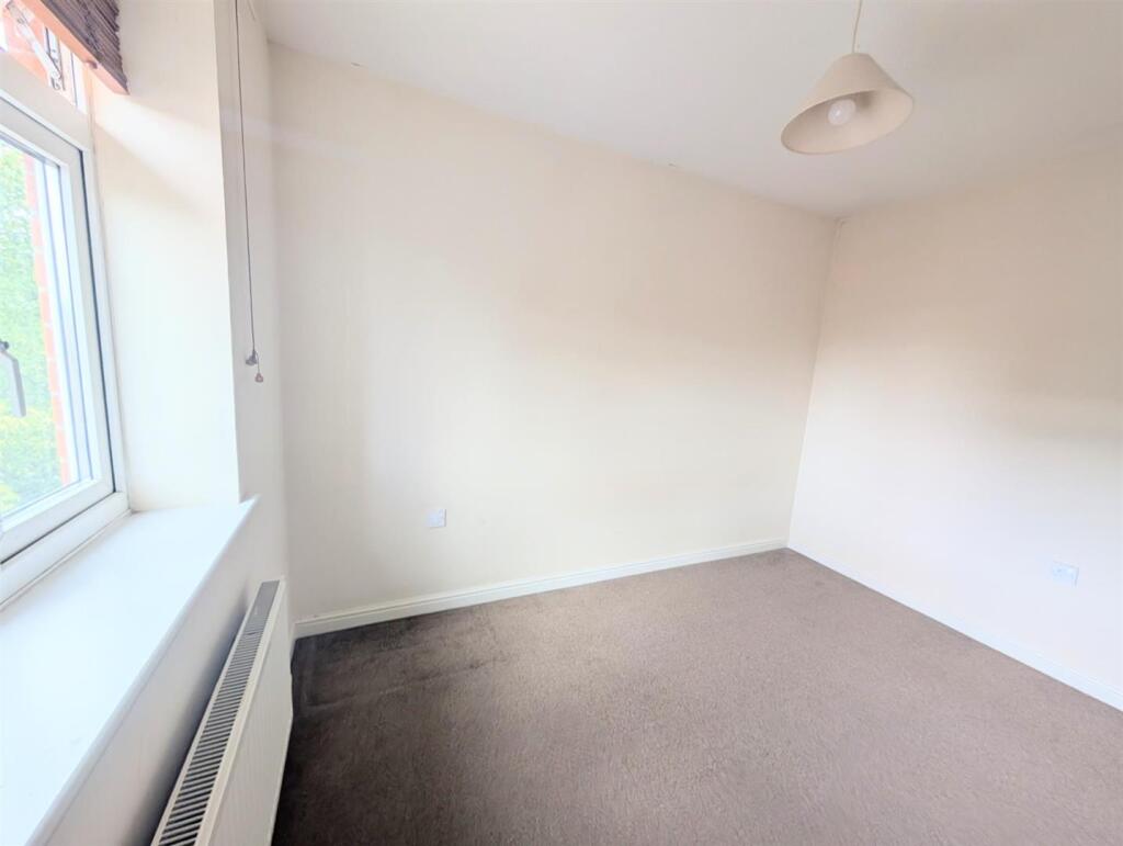 SECOND BEDROOM