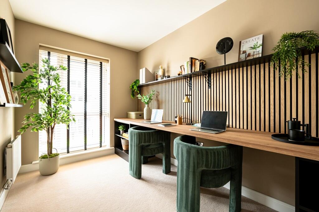 Versatile third bedroom, ideal for workspace or dressing room