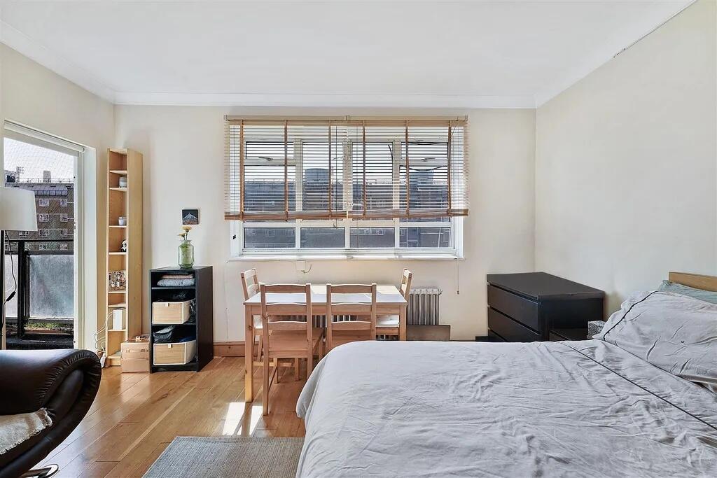 Bright and inviting double bedroom featuring a ...
