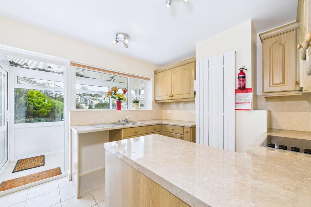Kitchen with access to garden sunroom