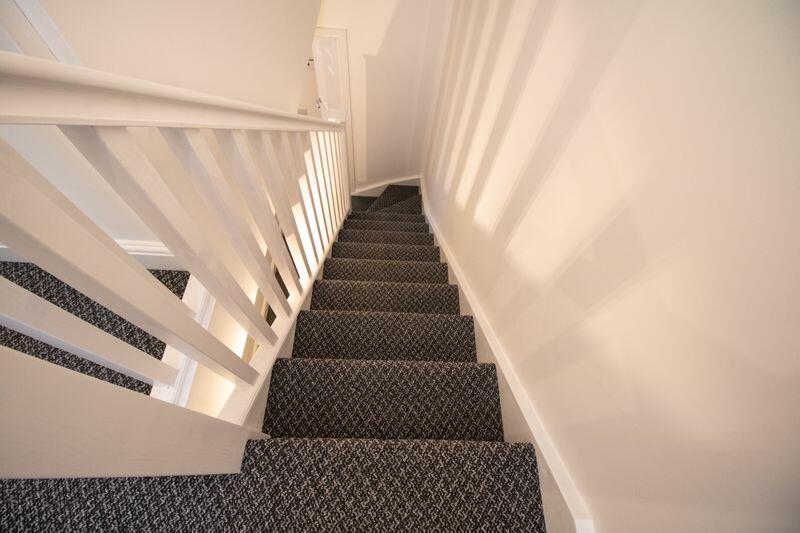 Stairwell to the 2 converted loft bed...