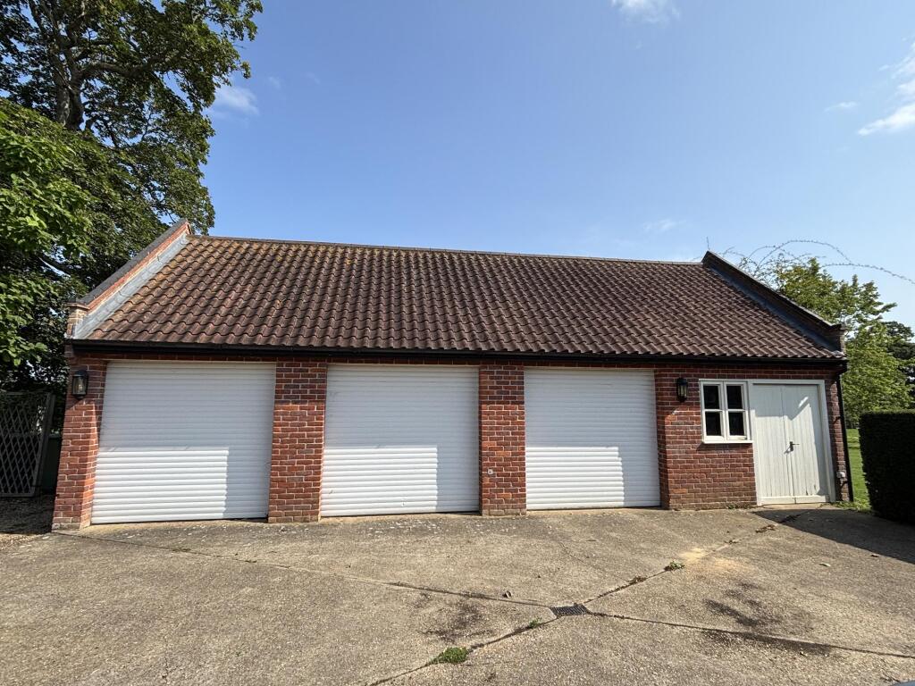 Triple Garage with storage room
