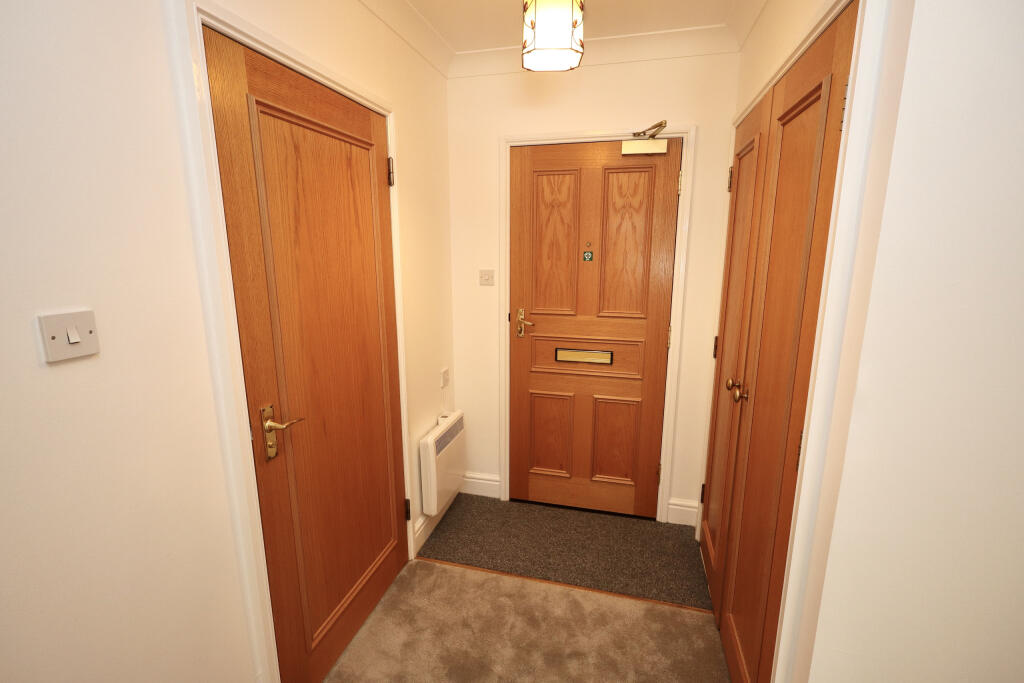 Inner hallway and storage cupboard