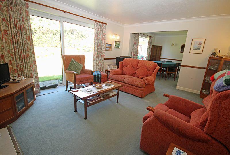 Sitting room open to dining area
