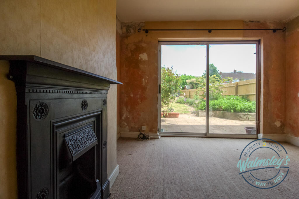 Rear sitting room &amp; fireplace