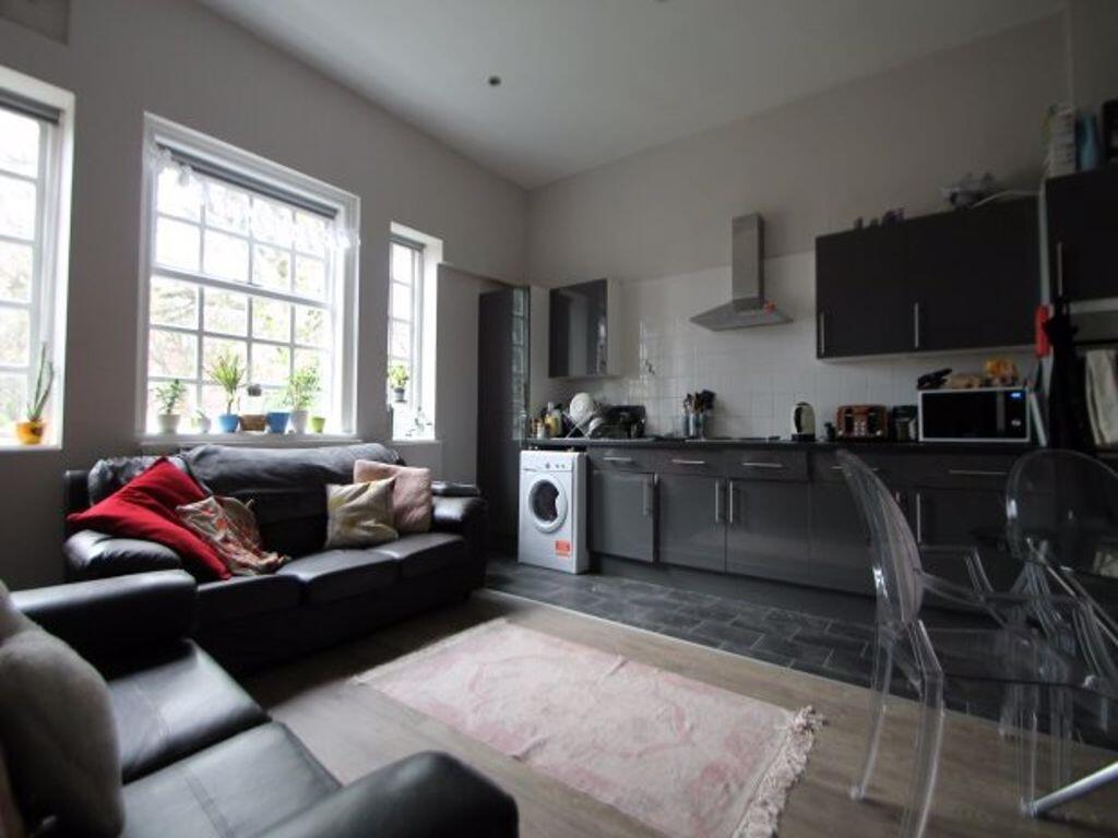 A bright and inviting modern living room featur...