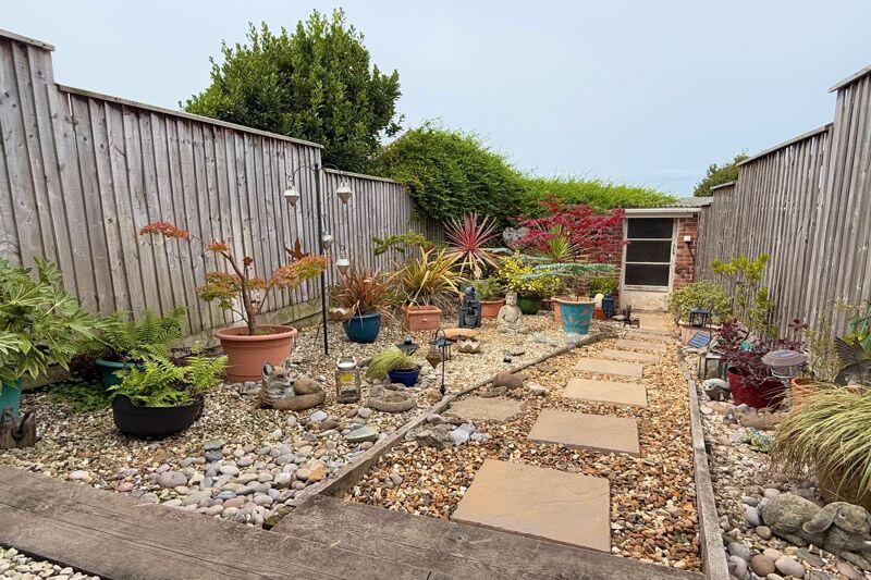 Rear Garden to Garage
