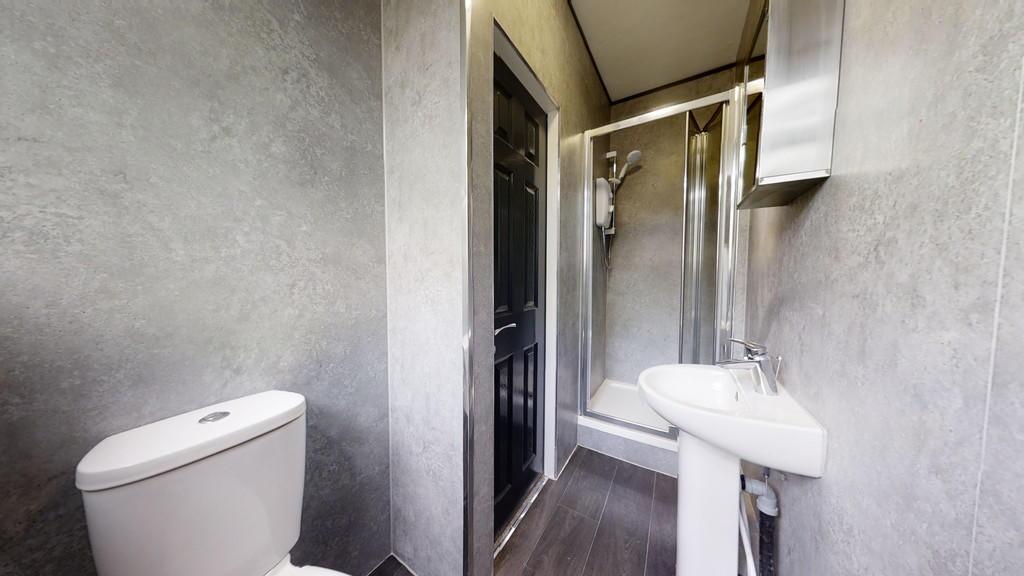 A modern and well-maintained bathroom featuring...