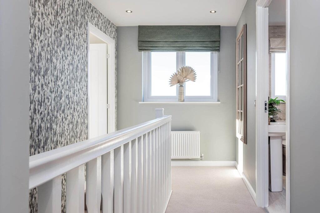 Spacious and bright landing flooded with natural light