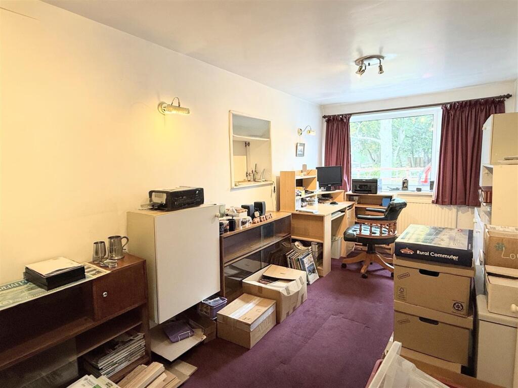 BEDROOM/FORMER ORIGINAL GARAGE