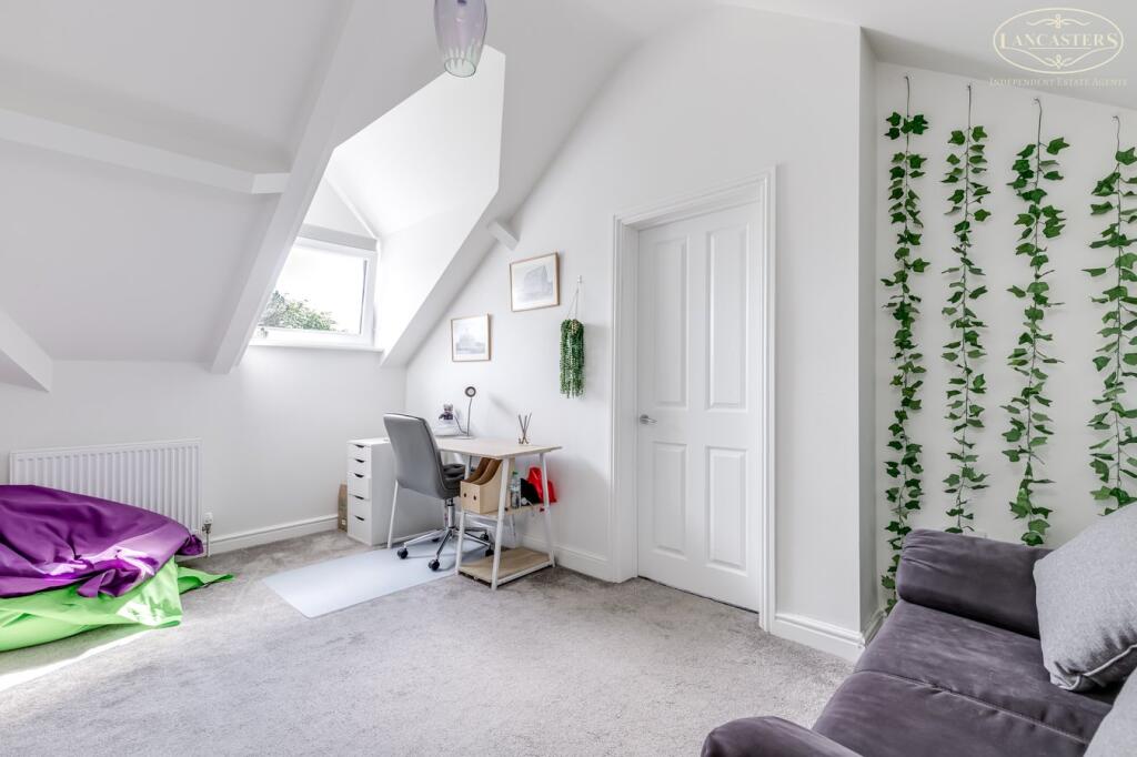 Bedroom 2 lounge area 