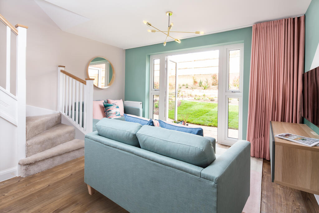 Lounge with French doors to the garden in the Denford 2 bedroom home