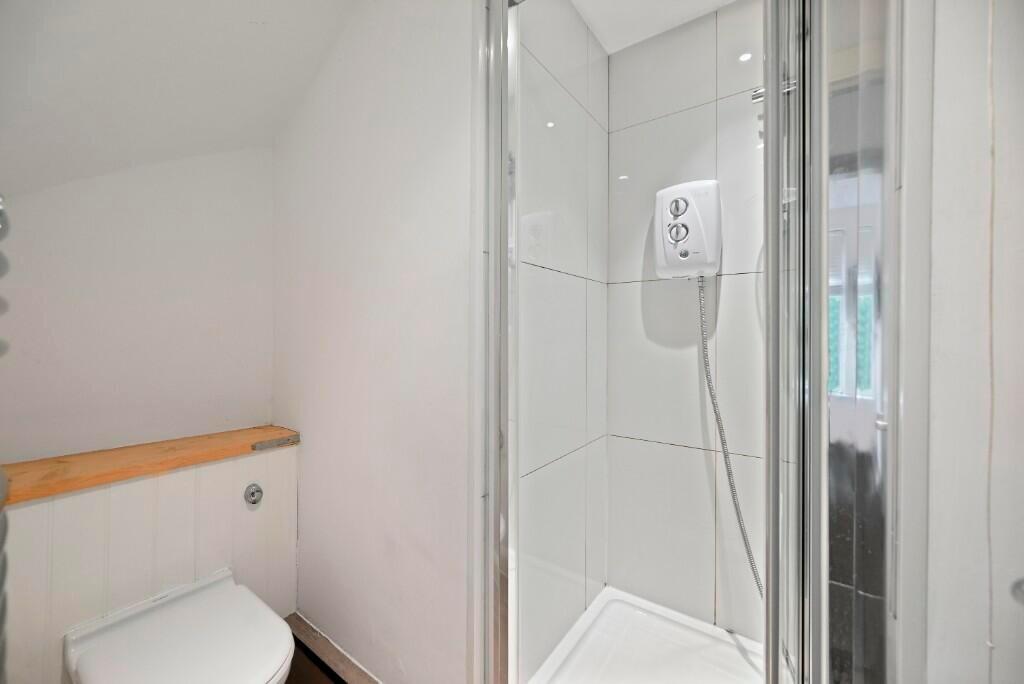 A bright and clean bathroom featuring a modern ...