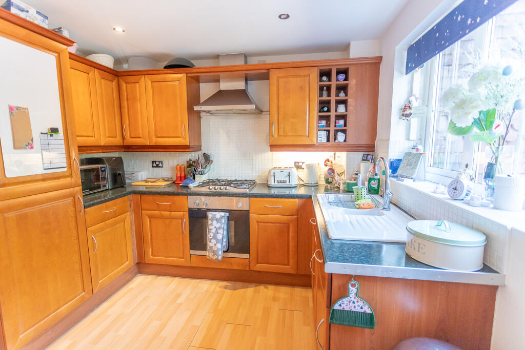 Kitchen area with integrated appliances