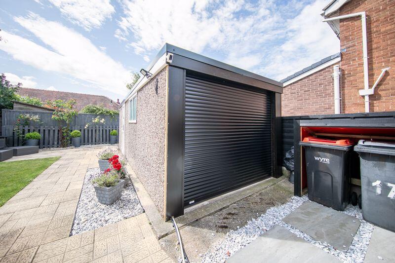 External garage and bin store