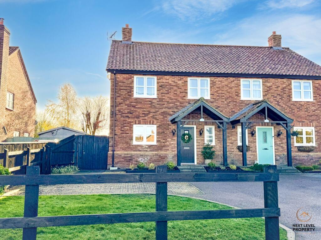 Front including garden and parking