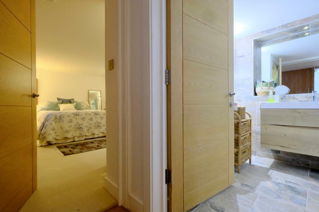 Solid wooden doors throughout