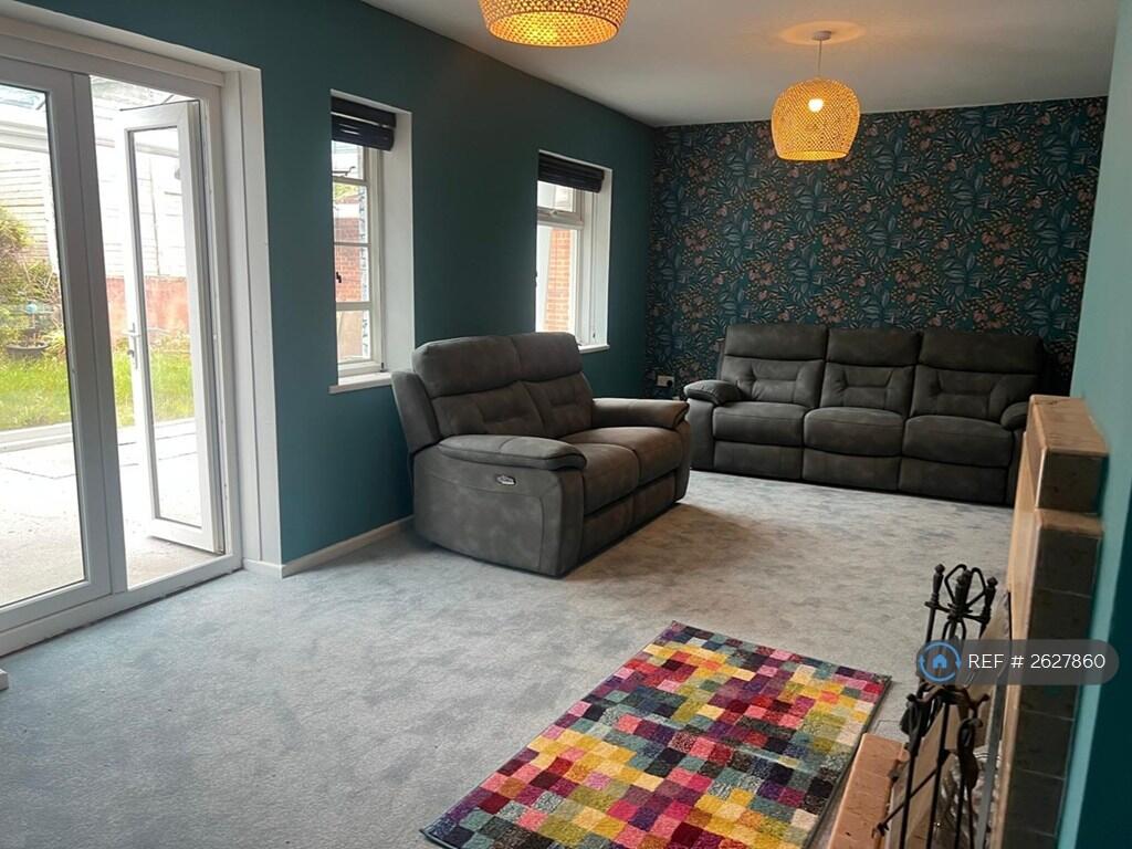 Lounge With Doors To Conservatory