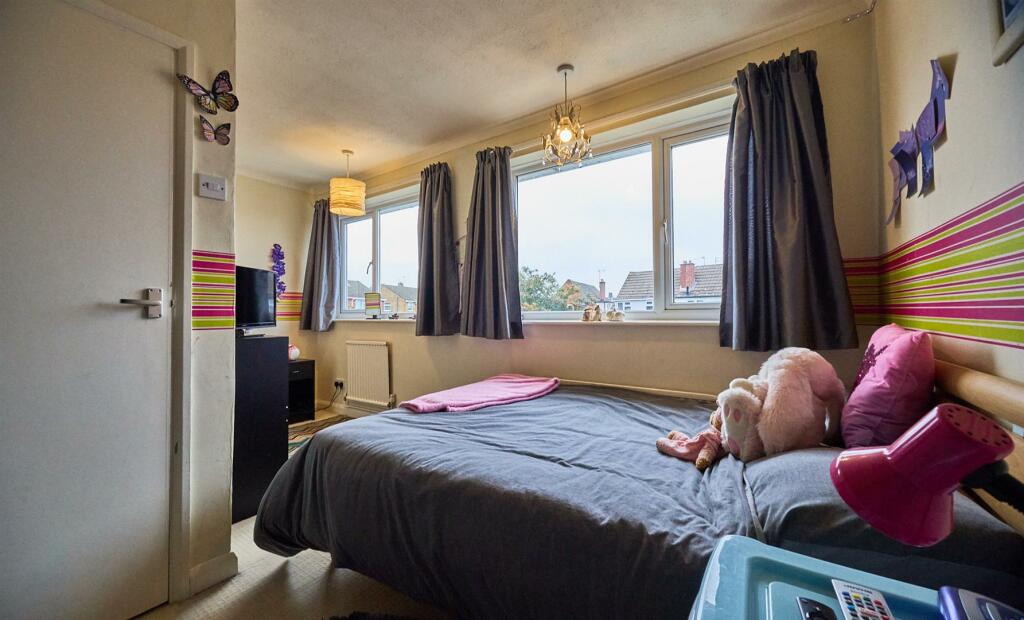 L SHAPED BEDROOM THREE TO REAR