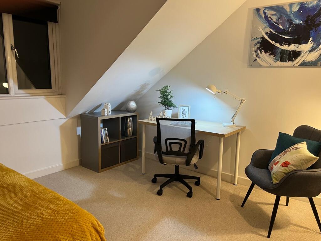 A spacious and inviting large double bedroom wi...