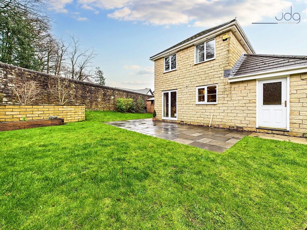 Spacious West-Facing Garden with Lawn and Seating Areas