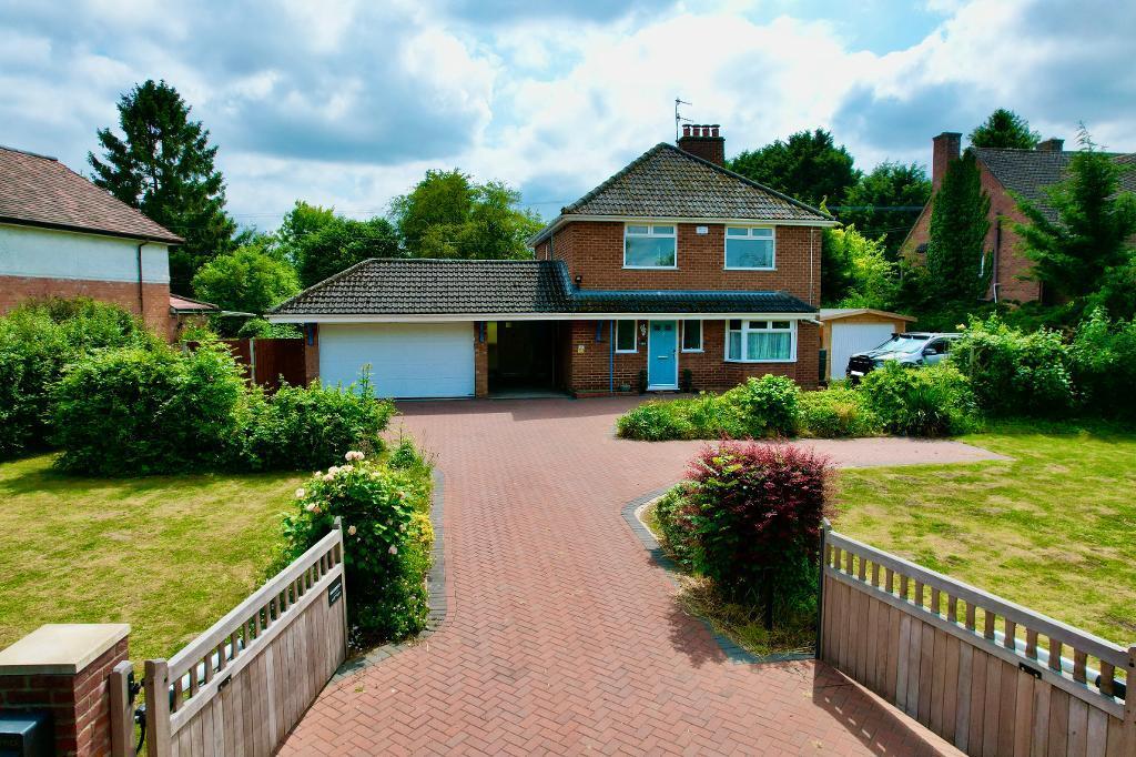 Front gardens with plenty of parking