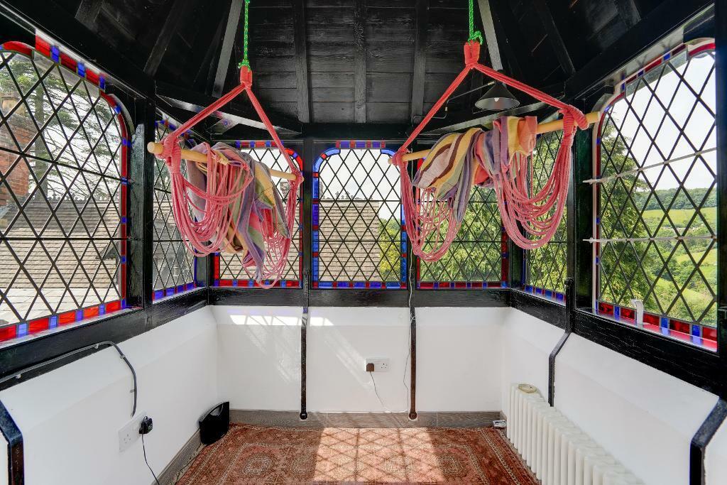 The Tower room with hammocks and views