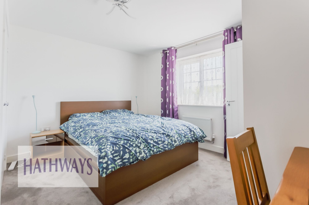 Master bedroom with a built-in wardrobe