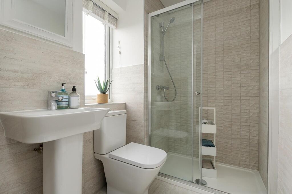 En suite bathroom away from the family