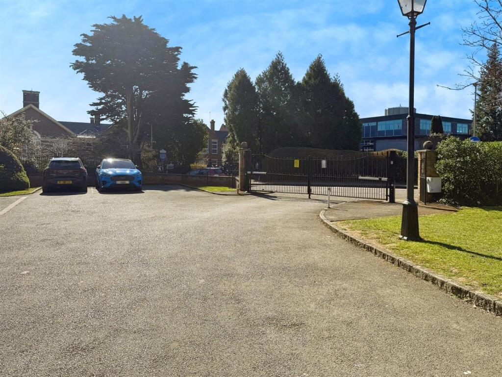 FRONT GATED AREA WITH VISITOR  PARKING